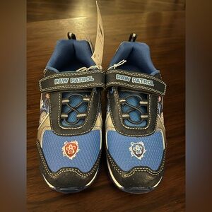 Paw Patrol Kids Sneakers in Blue and Black with lights.